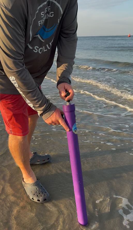 A picture of Candy Ghost Shrimp Pump and Aluminum Spike from Surf Fishing Solutions with Avid Angler in St. Augustine